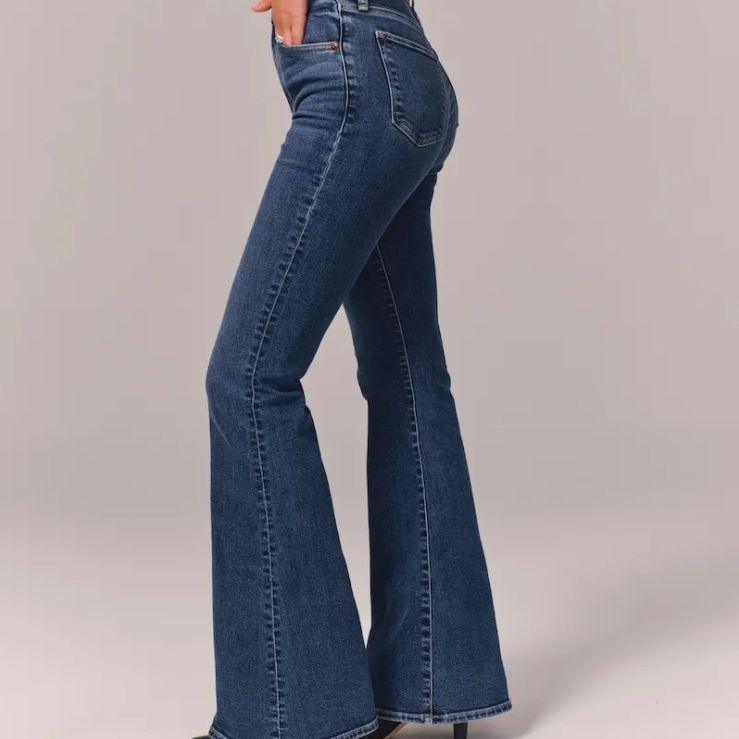 Retro Cowgirl High Waist Denim Jeans - Stylish Micro Flared Vintage Denim for Women in dark blue shown from the side