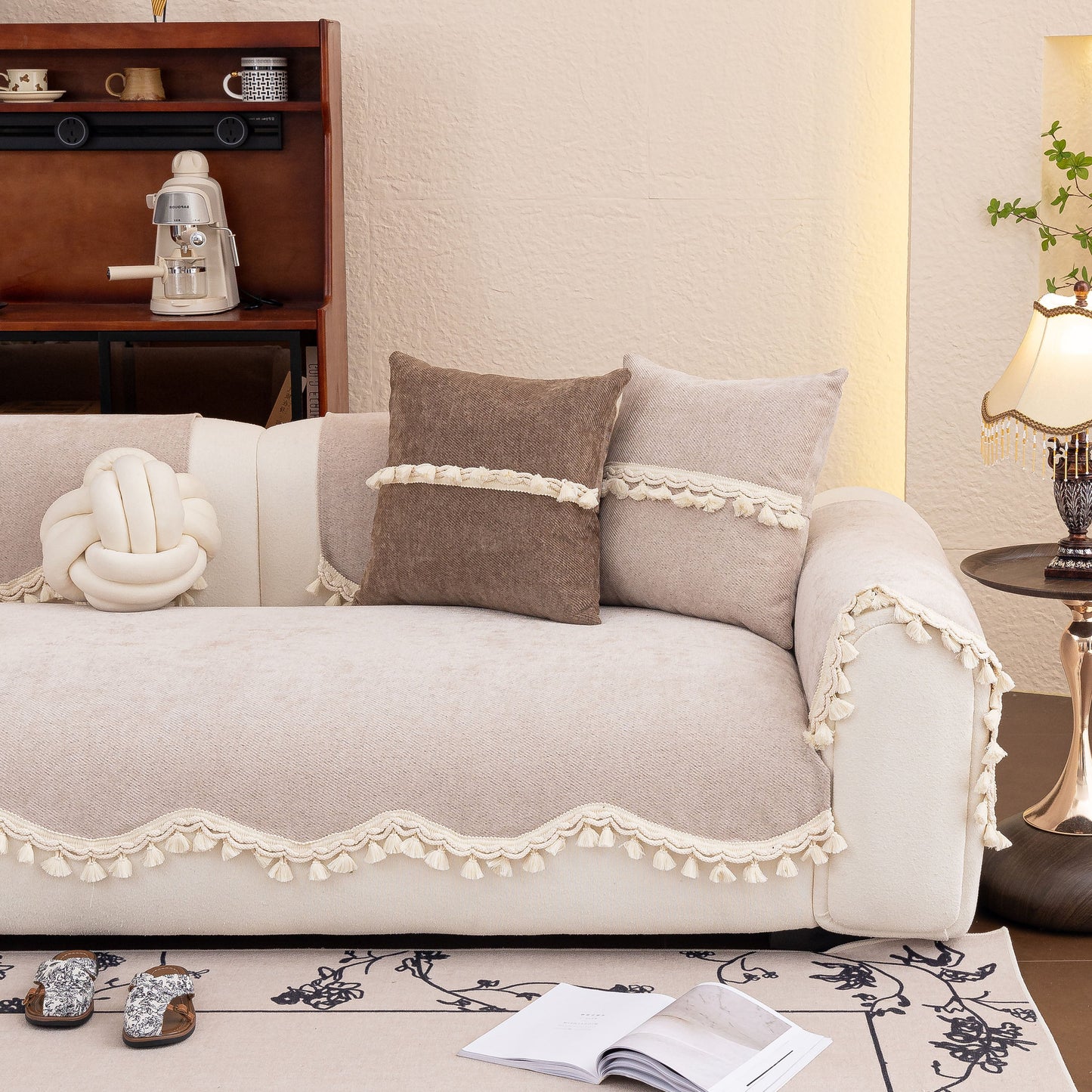 Chenille Sofa Cover Towel – Non-Slip, Washable Pets Couch Protector with Tassels on a white couch in a cozy living room