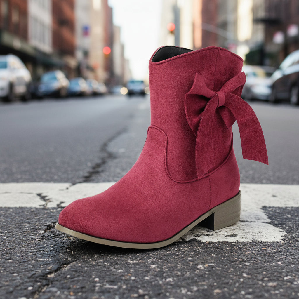 Low Heel Suede Large Size Sweet Bow Casual Boots for women with bow accent in an urban street setting.