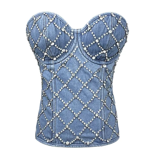 Rhinestone Cowgirl Denim Vest showcasing elegant rhinestone patterns on blue denim, highlighting Western fashion flair.