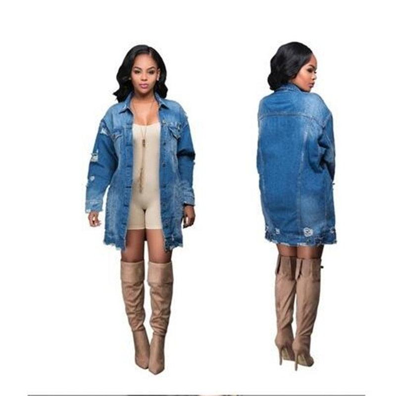 Model wearing Cowgirl Chic Boyfriend Denim Jacket | Distressed & Stylish Western Outerwear with long sleeves and distressed details.