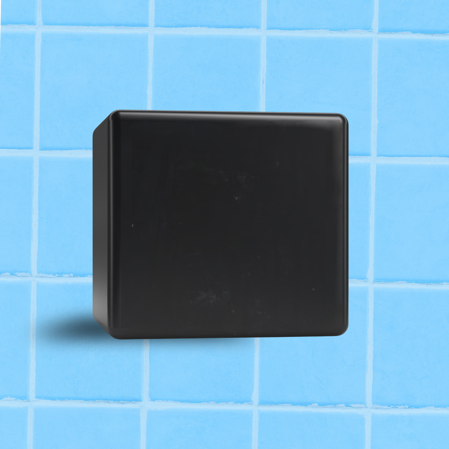 Perfect Acne Bar - charcoal soap for clear skin against blue tile background