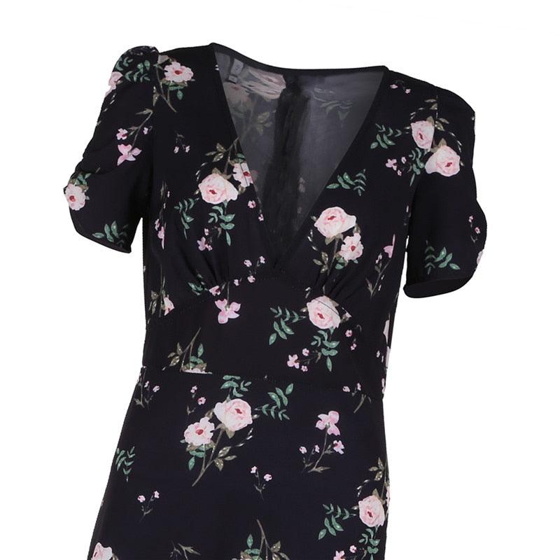 Boho Floral Summer Dress with black base and floral pattern, V-neckline, and short sleeves for effortless style and comfort