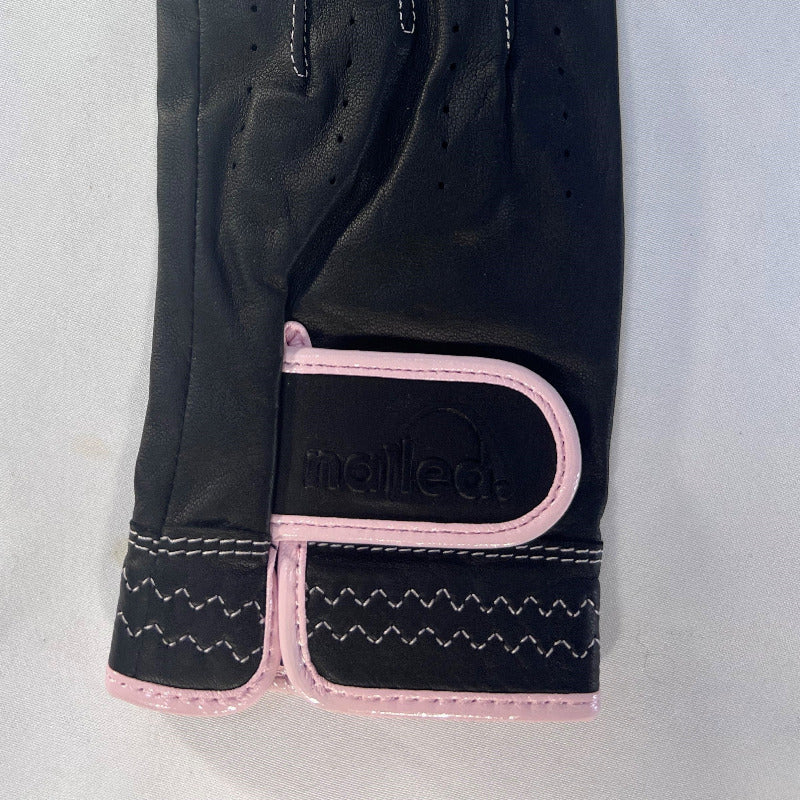 Premium Standard Golf Gloves - Colored for women with black and pink design, enhancing grip and style on the golf course.
