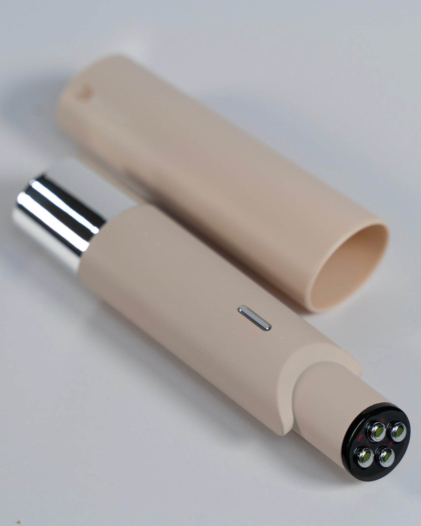 RF EMS Photon Eye Revitalizer - Compact eye rejuvenation device with ergonomic design and light therapy features.