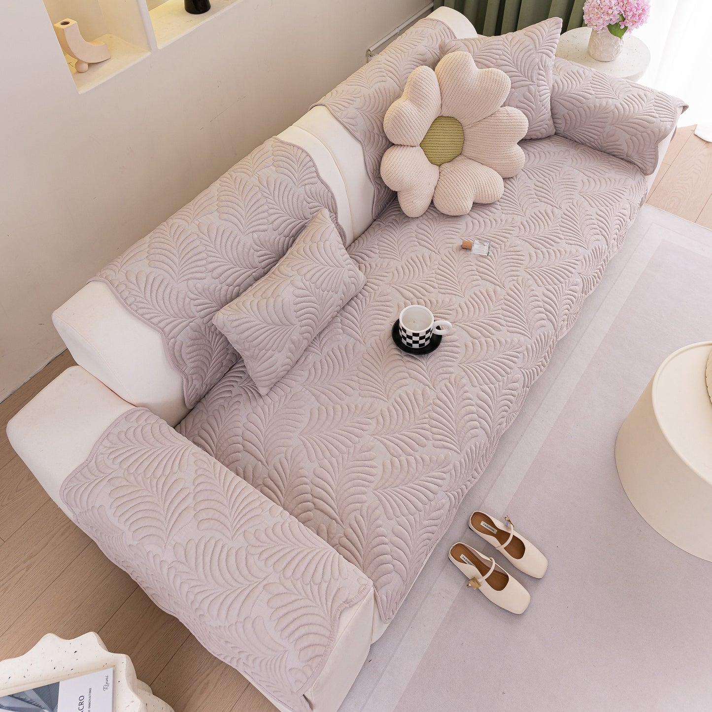 Sofa Cover for Leather & Fabric Couches, 3D Leaf Embossed Quilted Furniture Covers on elegant sofa setting.
