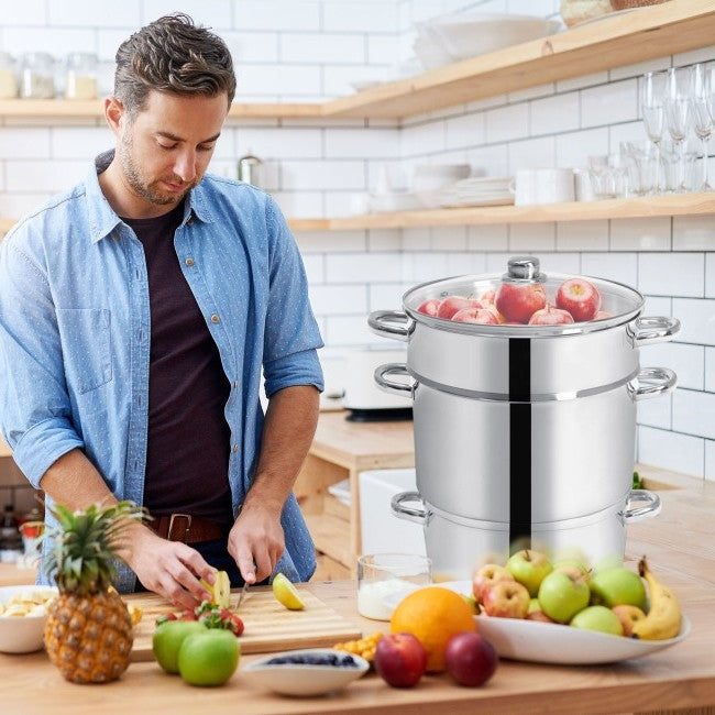 Man using 11 Quart Stainless Steel Steamer / Fruit Vegetable Juicer in modern kitchen