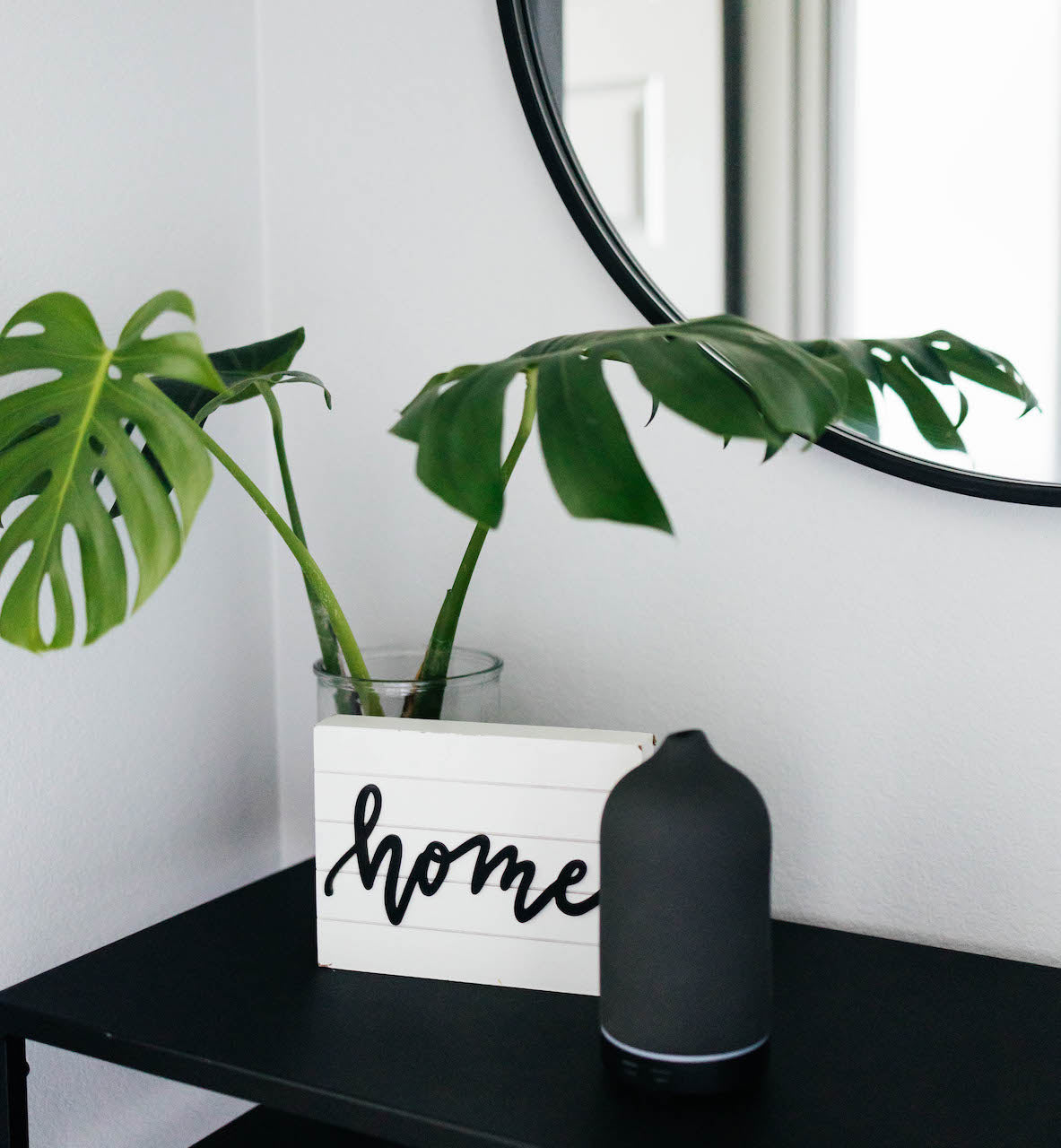 Ceramic Diffuser in elegant home setting beside indoor plant and home decor