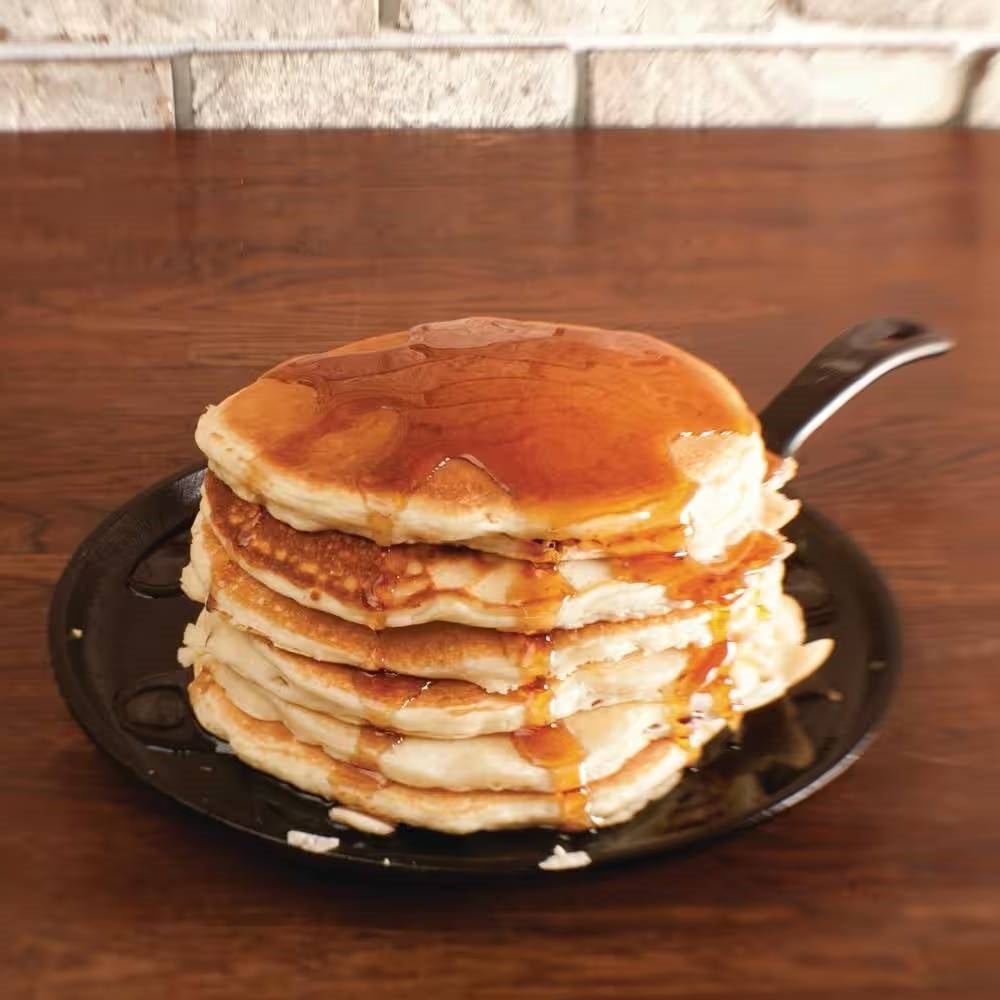 Stack of pancakes with syrup on 10.5 inch Round Pre-Seasoned Cast Iron Skillet Griddle Frying Pan Made in USA
