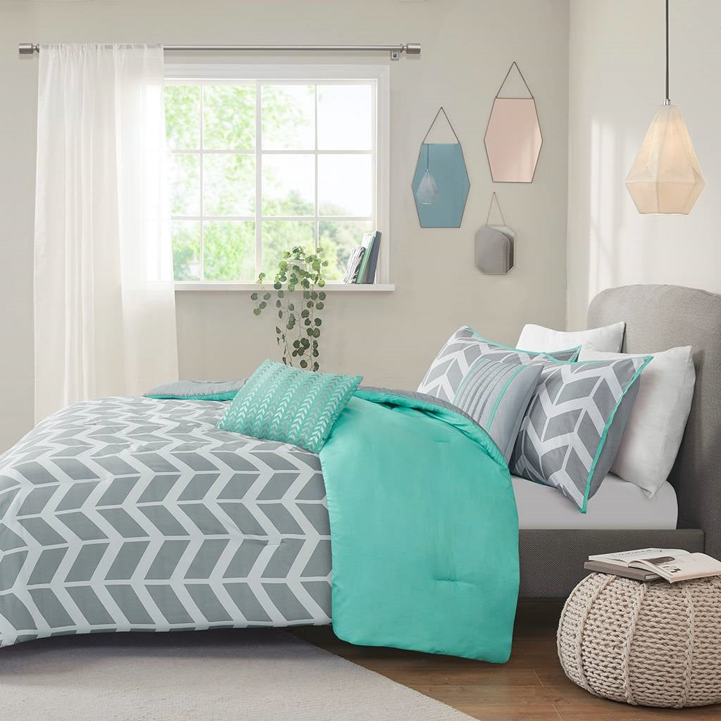 Twin/Twin XL Reversible Comforter Set in Grey White Aqua Teal Chevron Stripe on bed in stylish modern bedroom