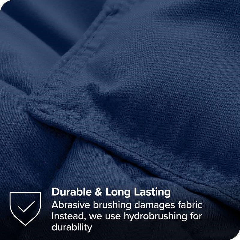 Close-up of navy Full/Double size Super Soft Down Alternative Comforter Set showcasing durable hydrobrushed fabric.