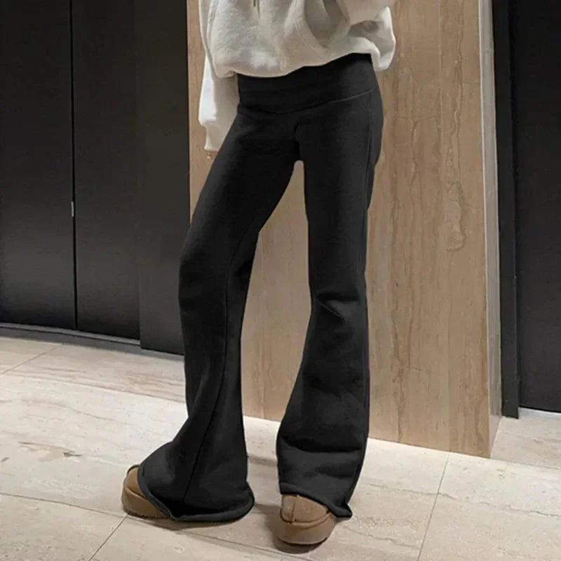 Woman wearing Low-Waisted Solid Flare Boot-Cut Pants Women in casual setting