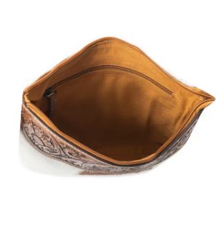 Interior view of Western Meadows Brown Hair-on Cowhide Crossbody Bag showing spacious golden lining and zipper pocket