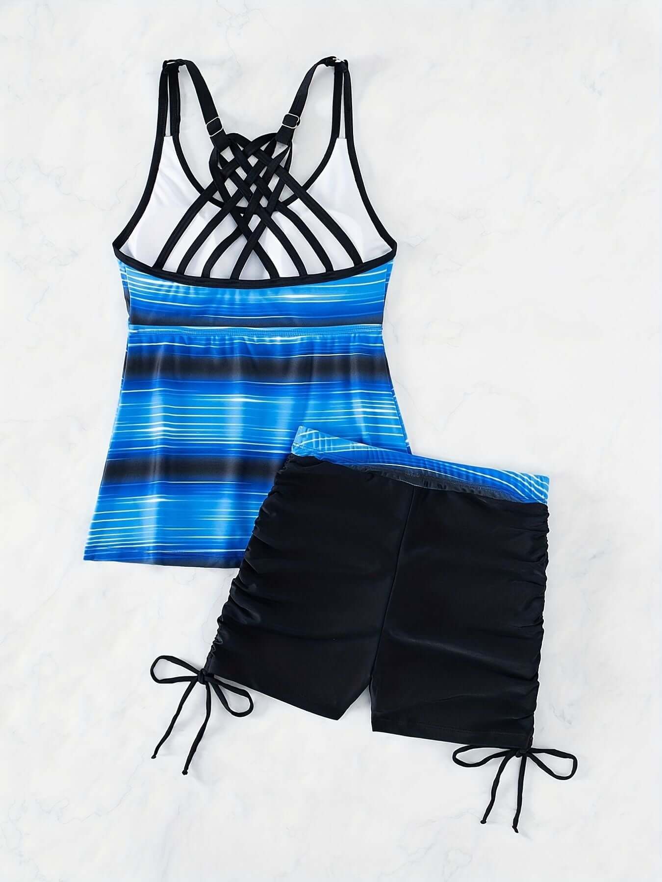 Striped print tankini set with criss cross strap and drawstring shorts, perfect swimwear from The Tabby Spot.
