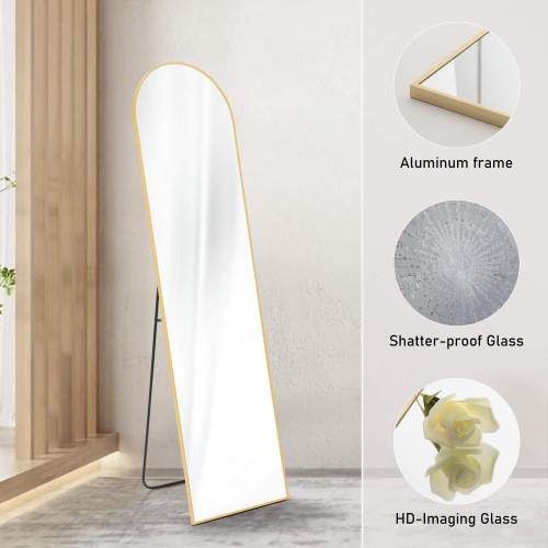 Floor standing mirror with thin aluminum frame and shatter-proof glass, 21''x64'', leaning against a wall, showing features and materials.