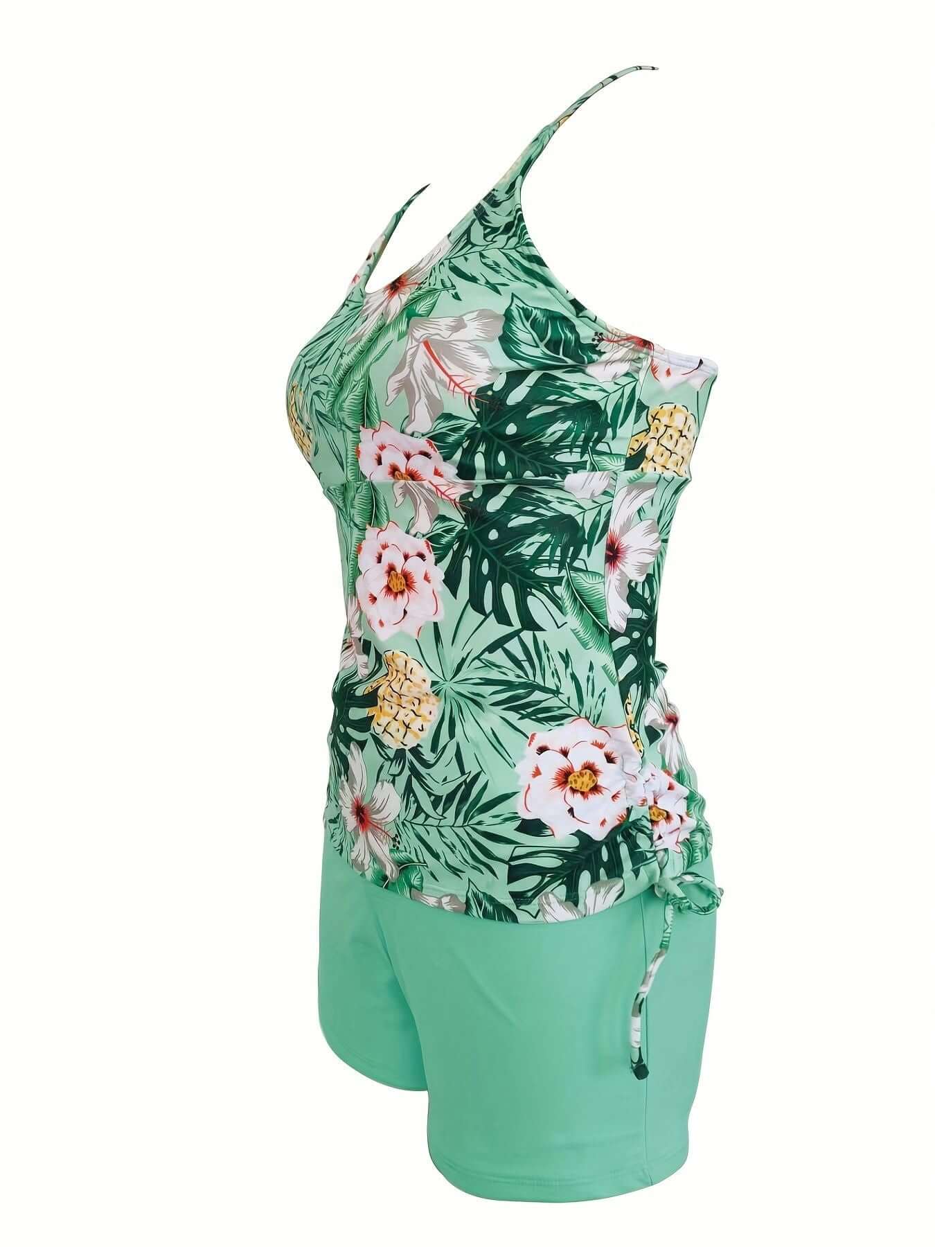 Women's floral print tankini set with drawstring detail from The Tabby Spot. Includes tank top and solid color boxer shorts. Swimwear set.