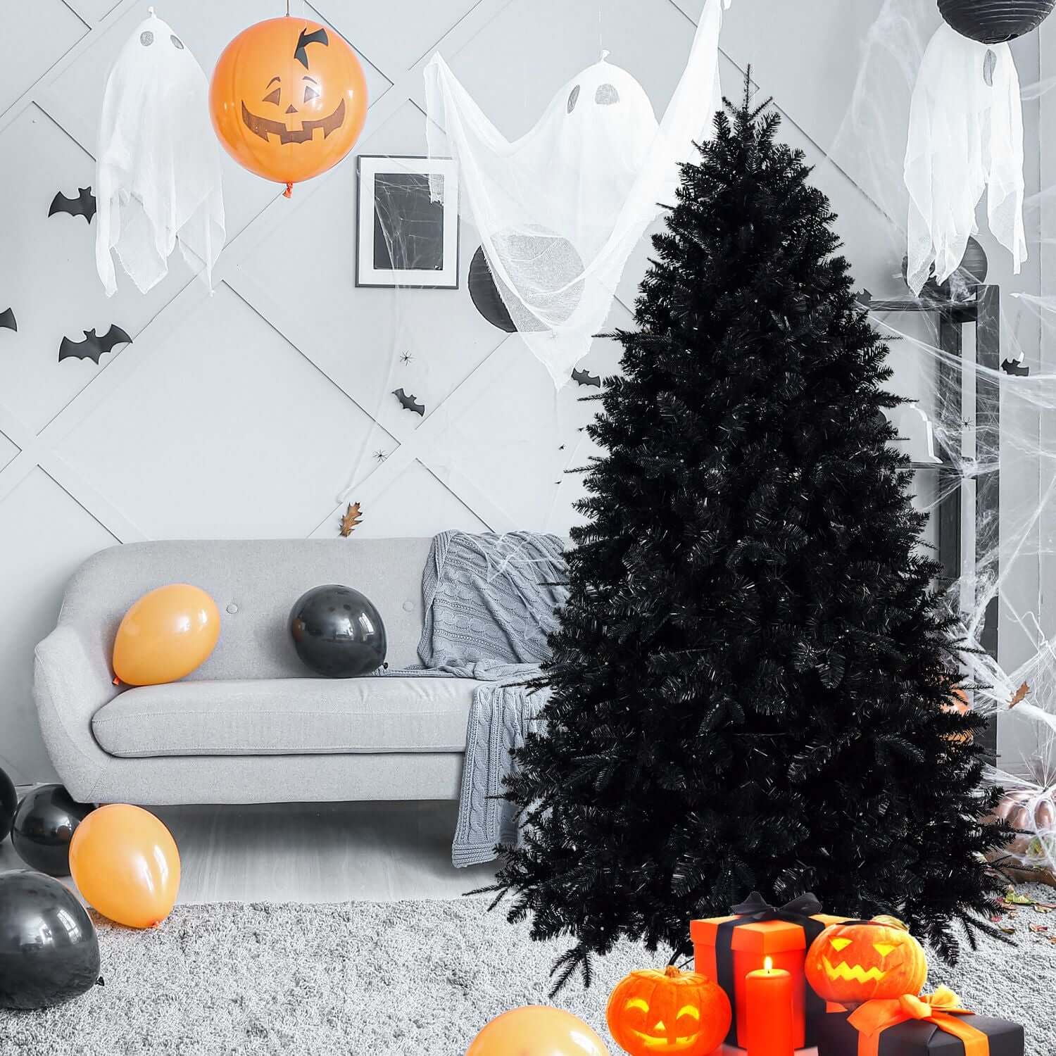 Black Christmas Tree with White LED Lights for Halloween decor with pumpkins and ghosts.