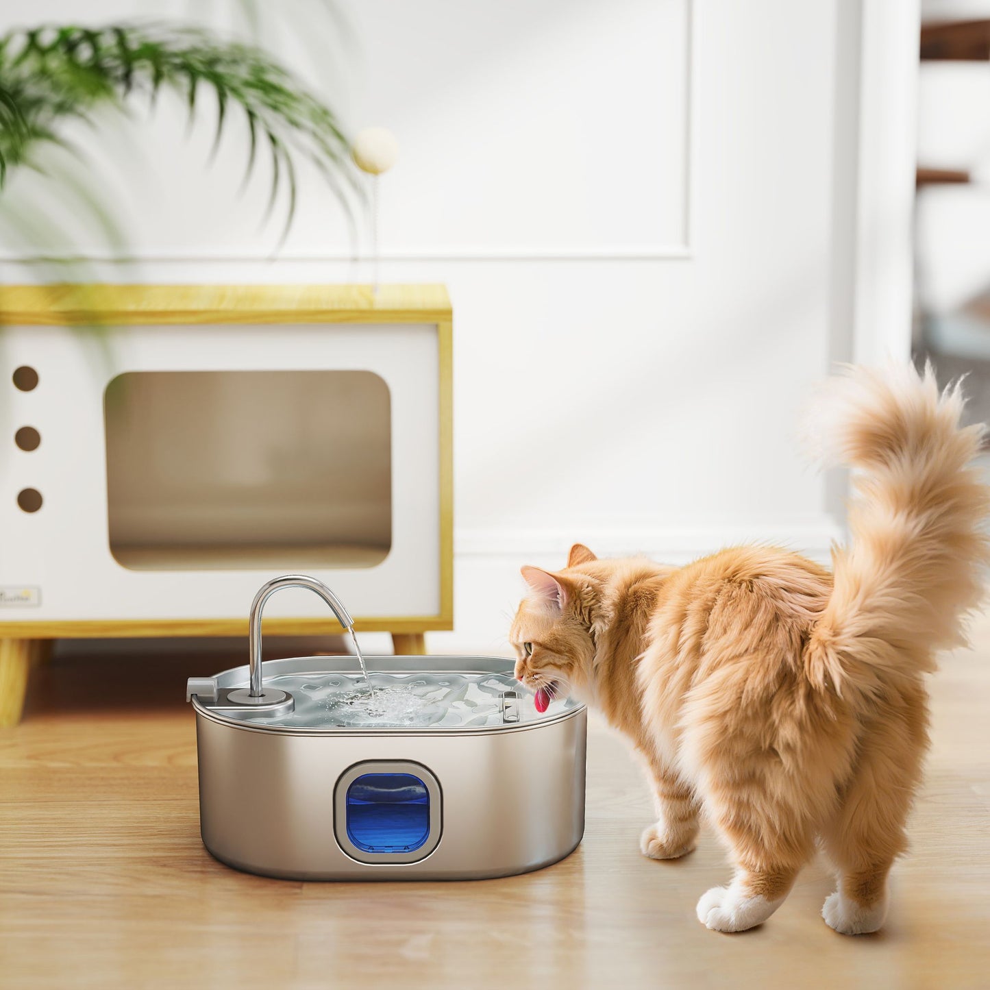 Cat drinking from PawHut 246 oz. stainless steel water fountain with LED light and filter, ideal for multi-pet homes.