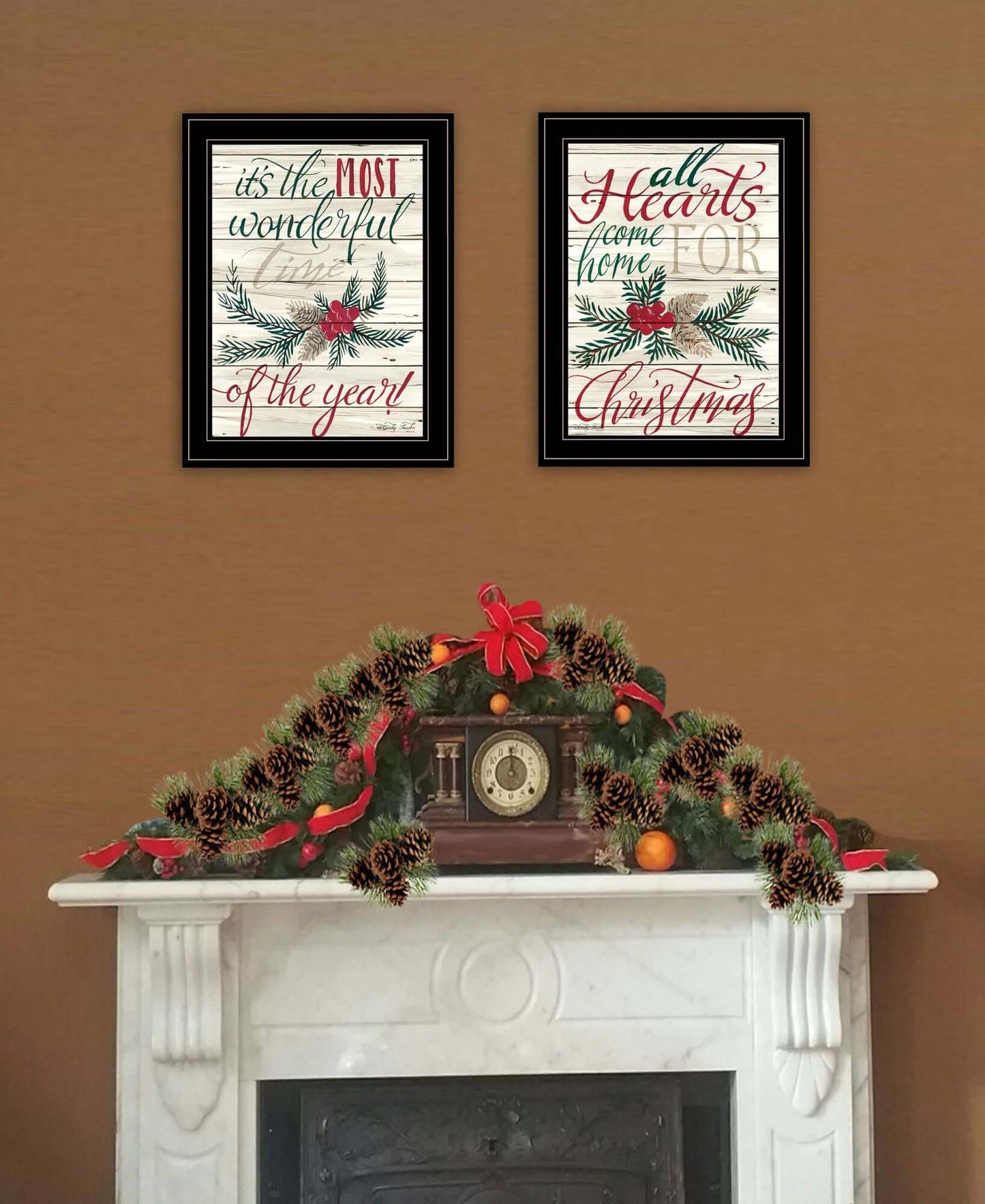 All Hearts Come Home for Christmas Vignette by Cindy Jacobs with two framed holiday prints above a festive mantel display.