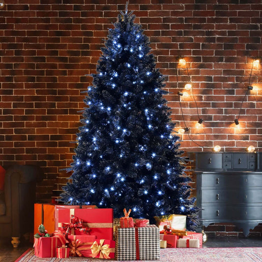 Black Christmas Tree with White LED Lights, 5ft holiday decor against a brick wall background, surrounded by wrapped gifts