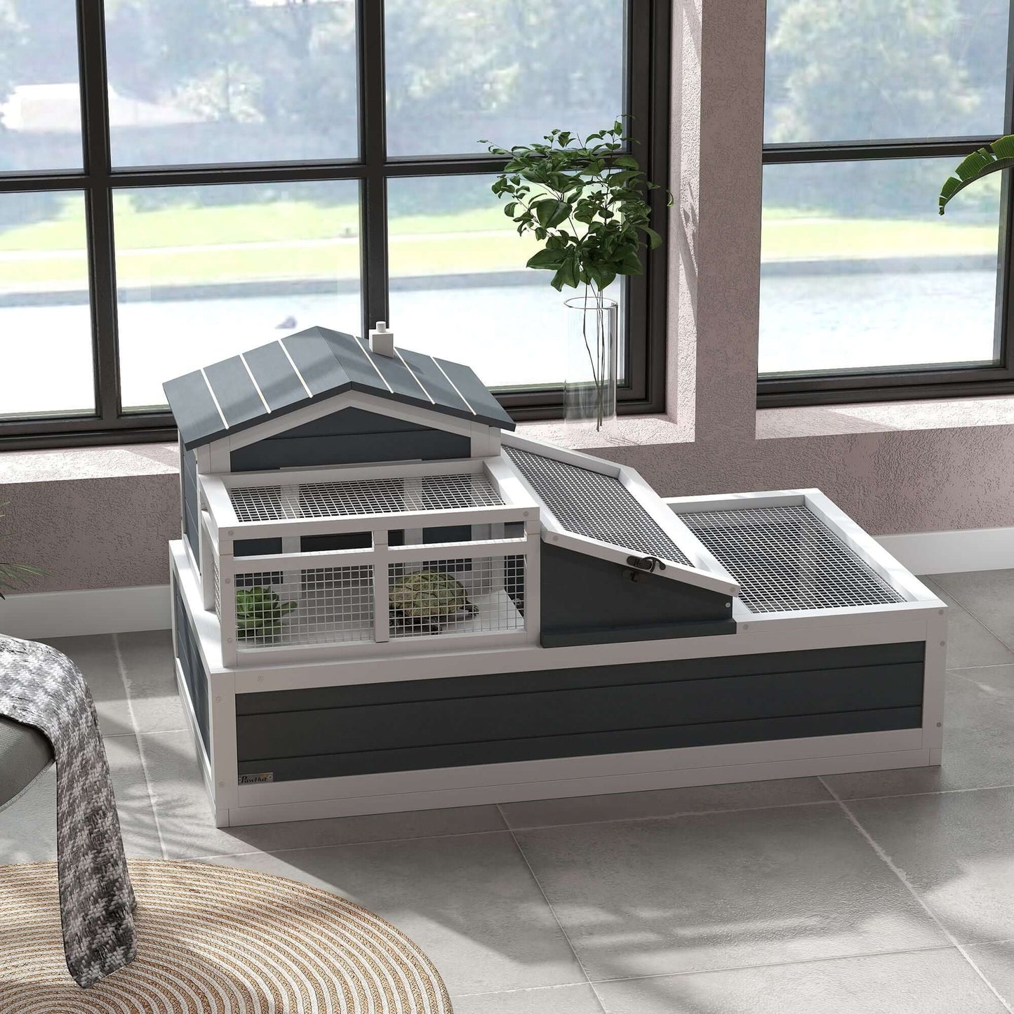 PawHut 3-Room Tortoise Habitat, Indoors & Outdoors Wooden Turtle Enclosure w/ Balcony & 2 Stories, 44" x 25.5" x 23", Gray in a sunlit room.
