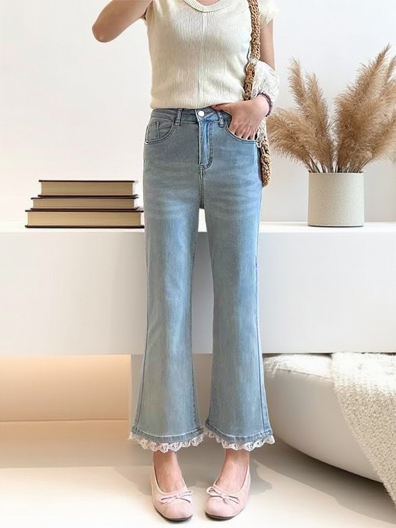 Light Blue Micro-Flare Lace Stretch Jeans for Women with lace trim and micro-flare hem, styled casually with a white top.