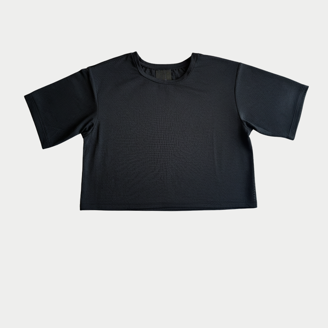 LA Gear Women’s Cropped Mesh Tee | Black with open mesh texture, relaxed sleeves, and boxy cropped design for breathable comfort.