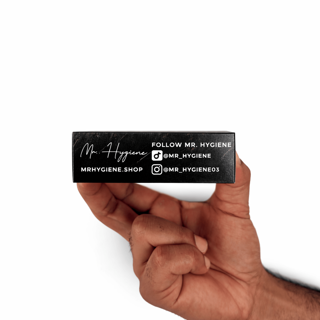 Person holding Nature’s Breeze Bar Soap with social media handles on the packaging
