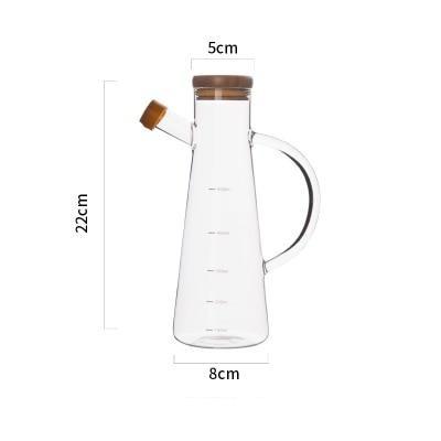 Modern Heat-Resistant Oil Bottle with round shape and eco-friendly engraved glass, featuring multiple certifications.