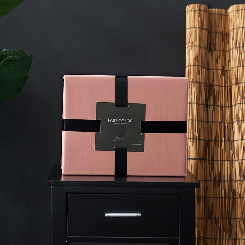 Venetia Duvet Cover Set 500TC Egyptian Cotton package on dark furniture with bamboo accent