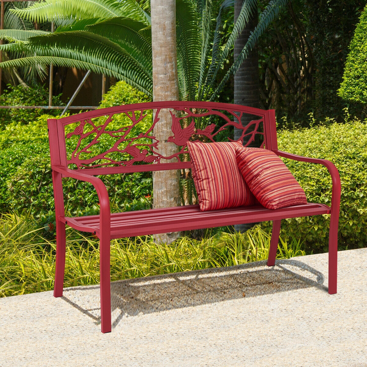 Patio Garden Bench Park Yard Outdoor Furniture with cast iron back and pillows on a sunny porch