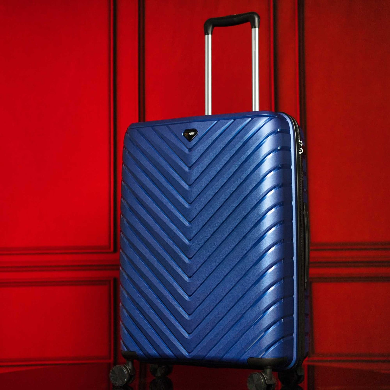 Stylish blue suitcase, part of Curated Travel Accessories, perfect for enhancing your travel experience with function and flair.