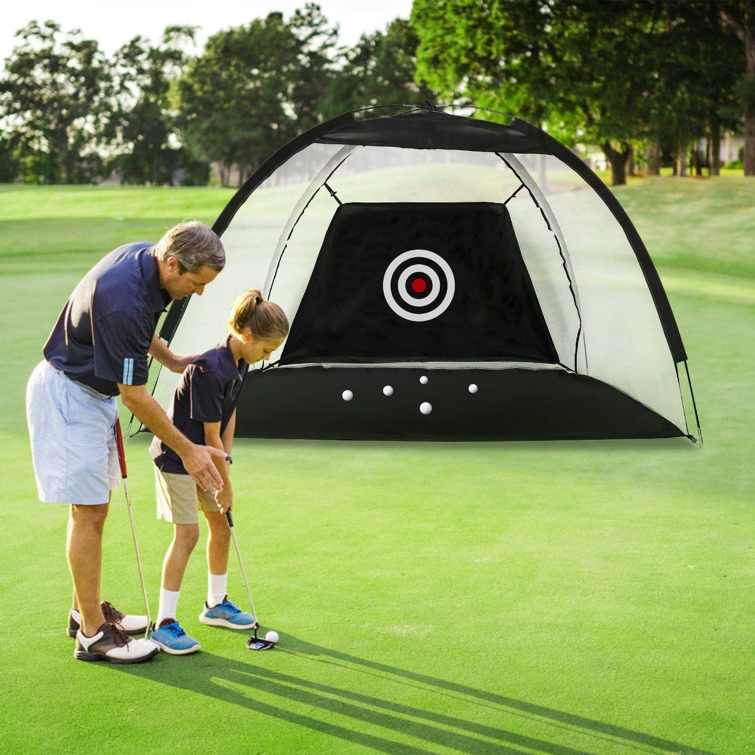 Father and son practicing golf with a target net, part of the Curated Sports Lifestyle Collection.