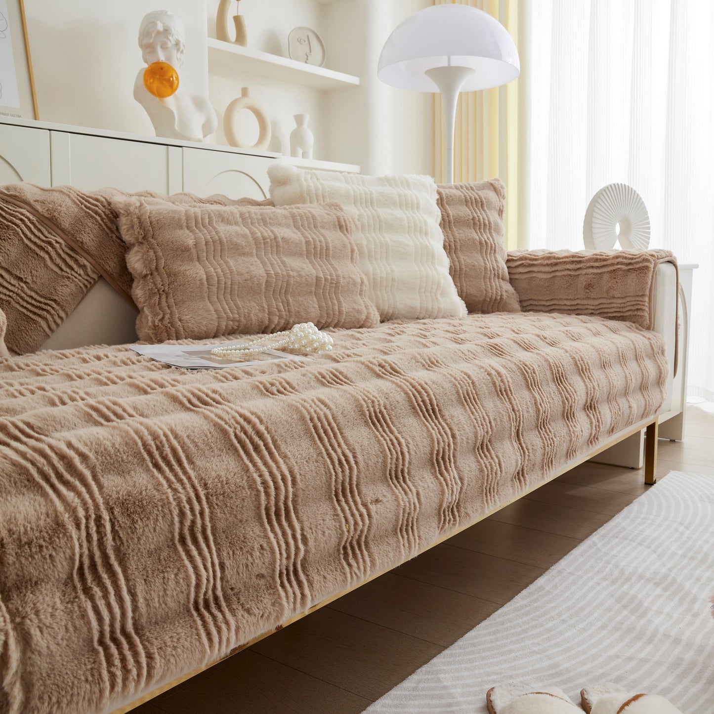Stylish living room with Soft Thick Faux Fur Sofa Cover Stripe Fluffy Fuzzy Non-Slip Washable Couch Covers on beige sofa.
