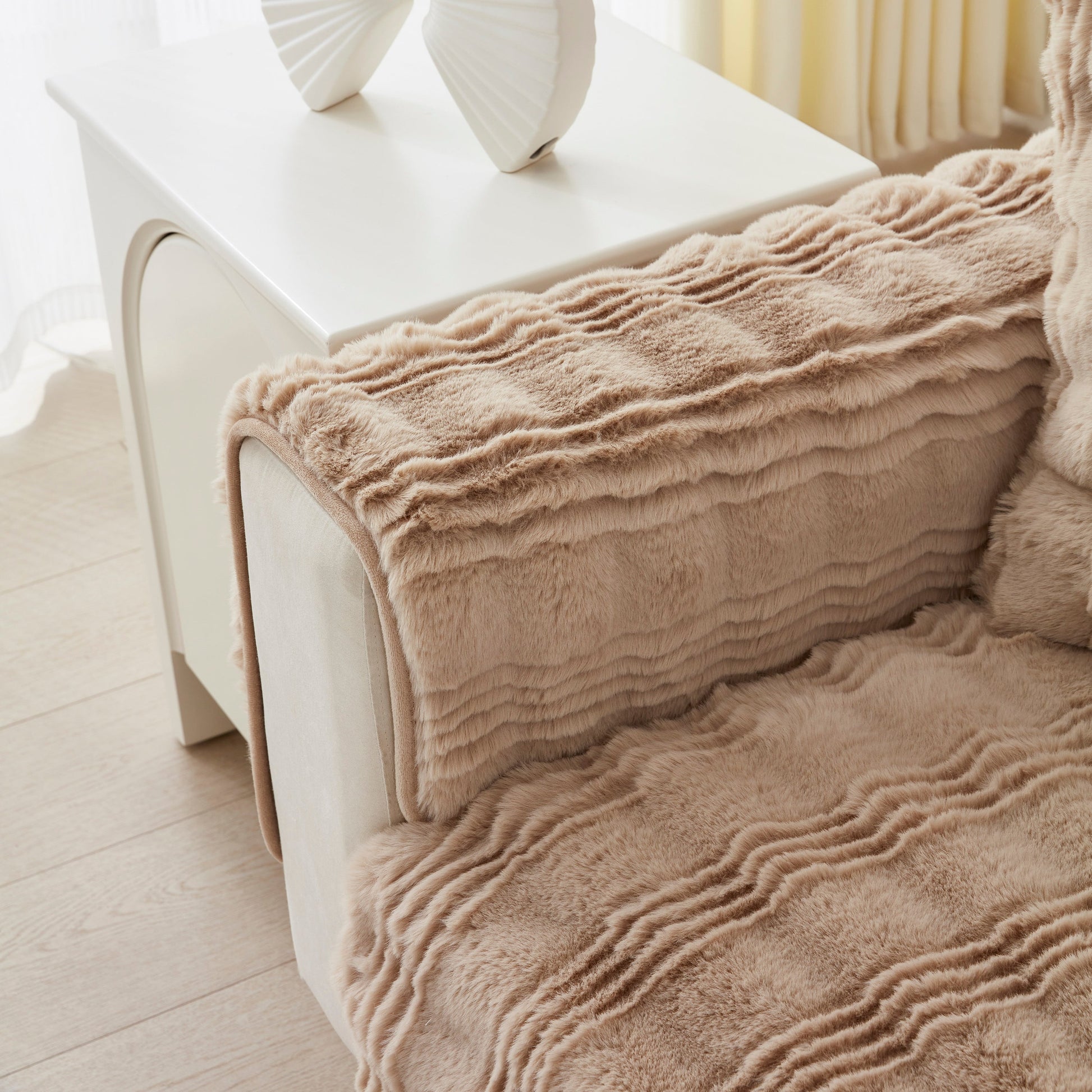 Soft Thick Faux Fur Sofa Cover Stripe Fluffy Fuzzy Non-Slip Washable Couch Covers on a stylish beige couch