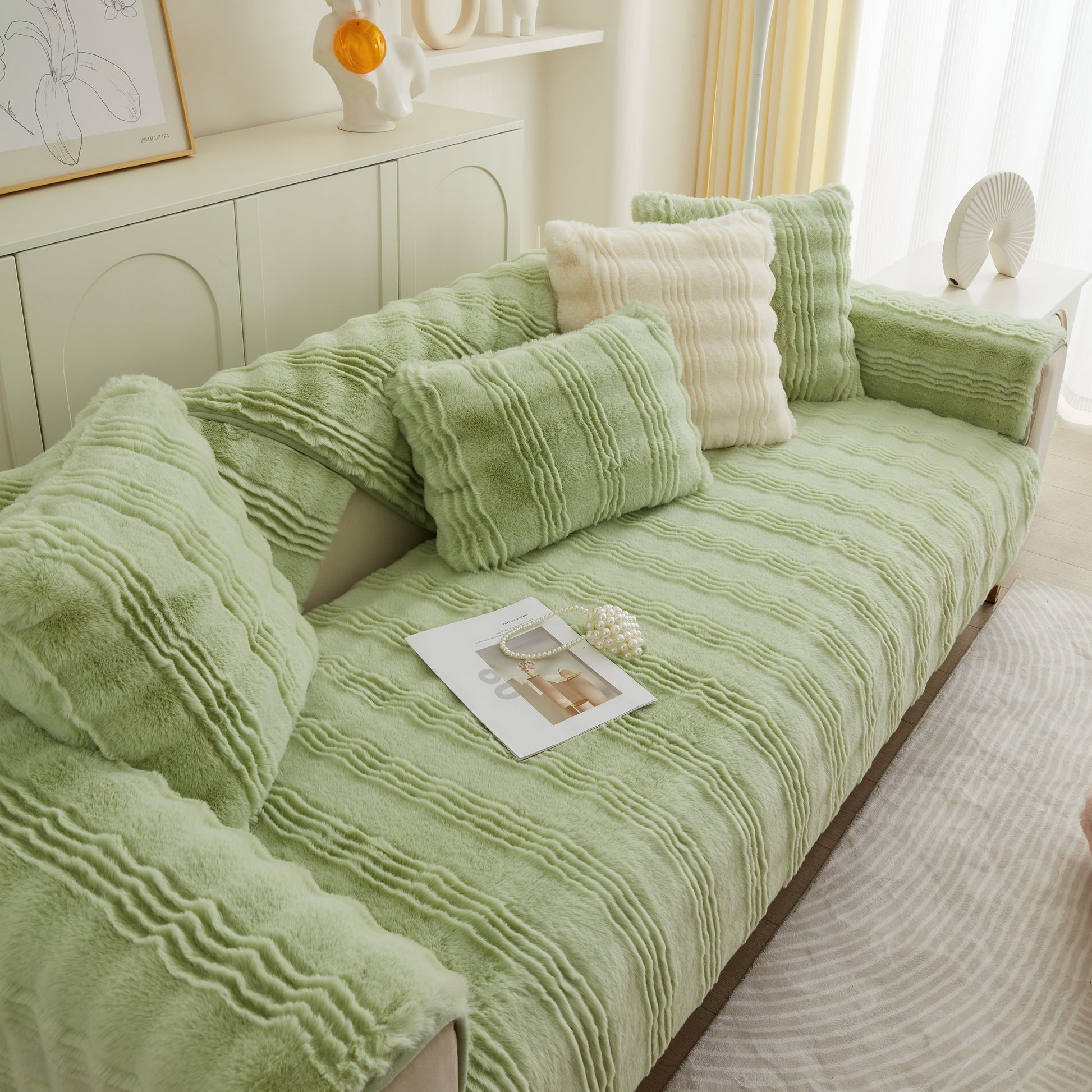 Soft Thick Faux Fur Sofa Cover Stripe Fluffy Fuzzy Non-Slip Washable Couch Covers in green on a living room sofa