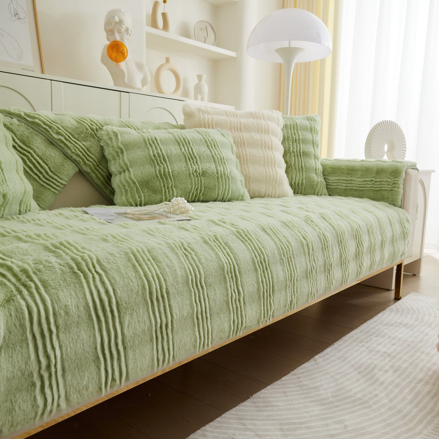 Soft Thick Faux Fur Sofa Cover Stripe Fluffy Fuzzy Non-Slip Washable Couch Covers on a stylish green sofa