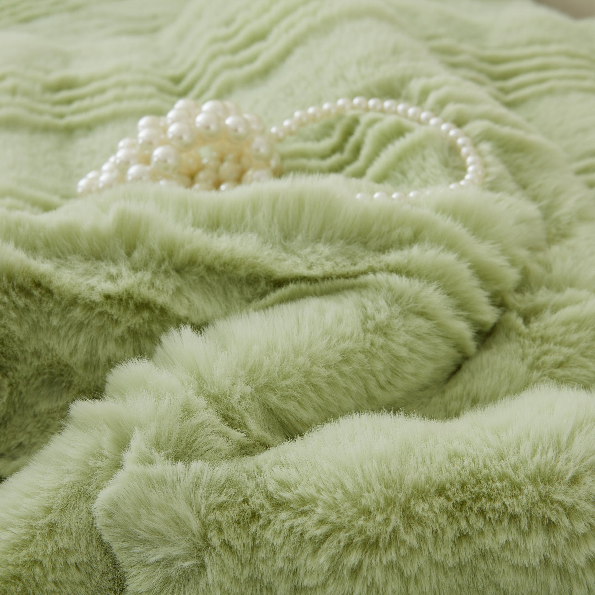 Soft Thick Faux Fur Sofa Cover Stripe Fluffy Fuzzy Non-Slip Washable Couch Covers, luxurious and cozy green texture.