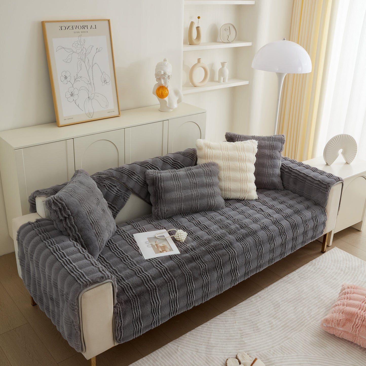 Living room with Soft Thick Faux Fur Sofa Cover Stripe Fluffy Fuzzy Non-Slip Washable Couch Covers in gray, styled with décor.