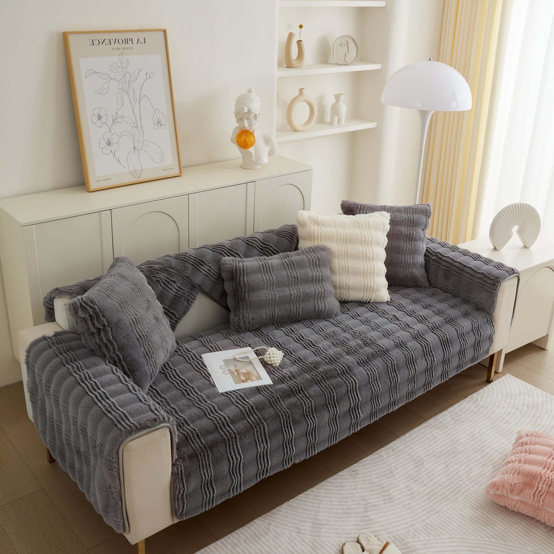 Living room with Soft Thick Faux Fur Sofa Cover Stripe Fluffy Fuzzy Non-Slip Washable Couch Covers in gray, styled with décor.