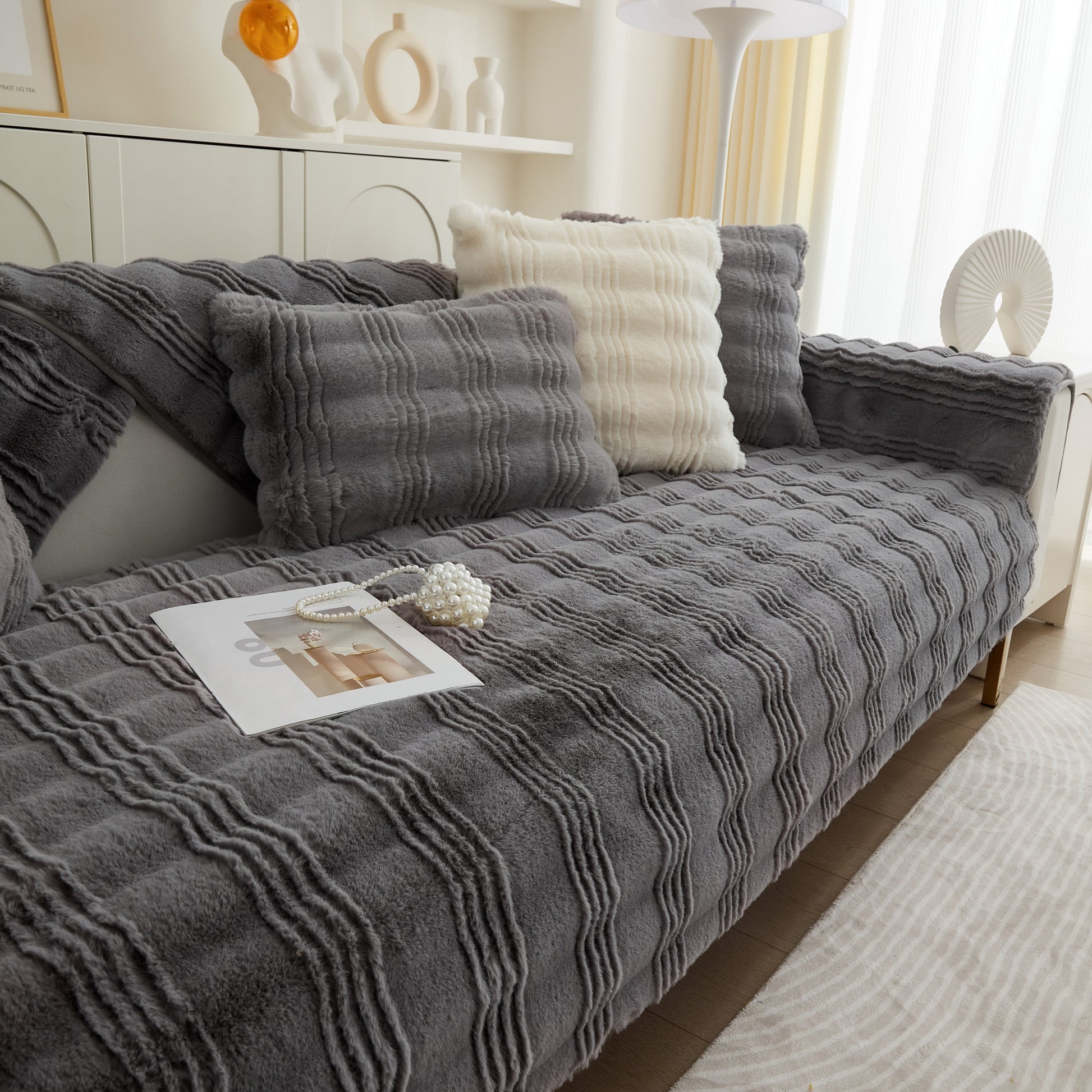 Soft Thick Faux Fur Sofa Cover Stripe Fluffy Fuzzy Non-Slip Washable Couch Covers on a stylish modern sofa