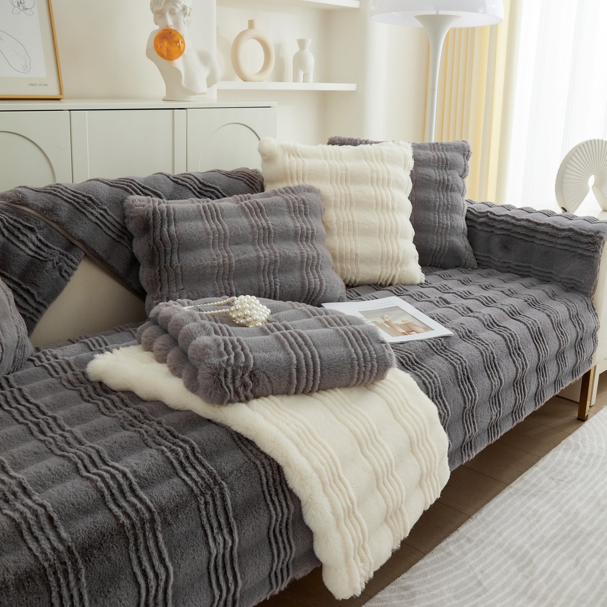Soft Thick Faux Fur Sofa Cover Stripe Fluffy Fuzzy Non-Slip Washable Couch Covers on a stylish living room couch.