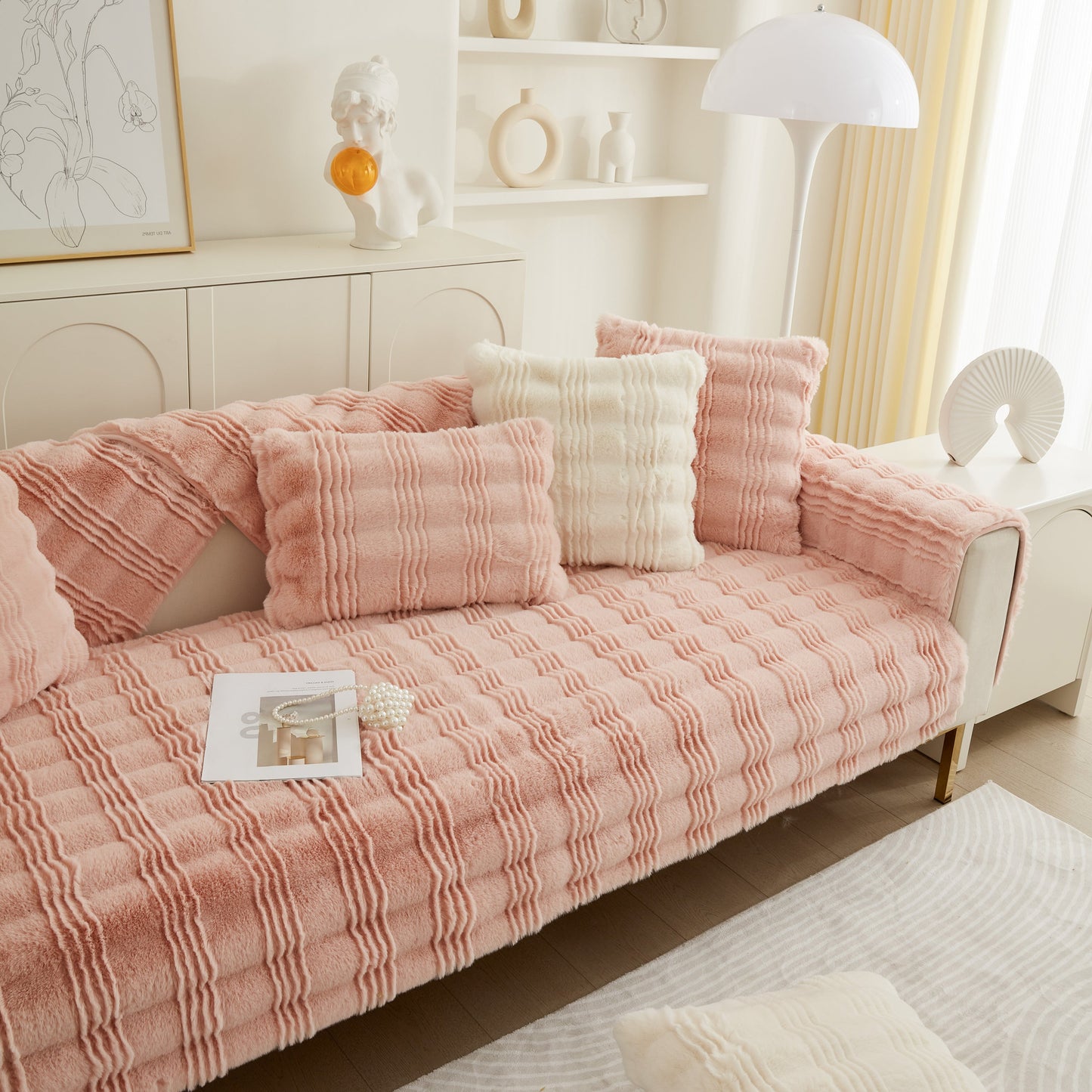 Soft Thick Faux Fur Sofa Cover Stripe Fluffy Fuzzy Non-Slip Washable Couch Covers in pink on a modern sofa