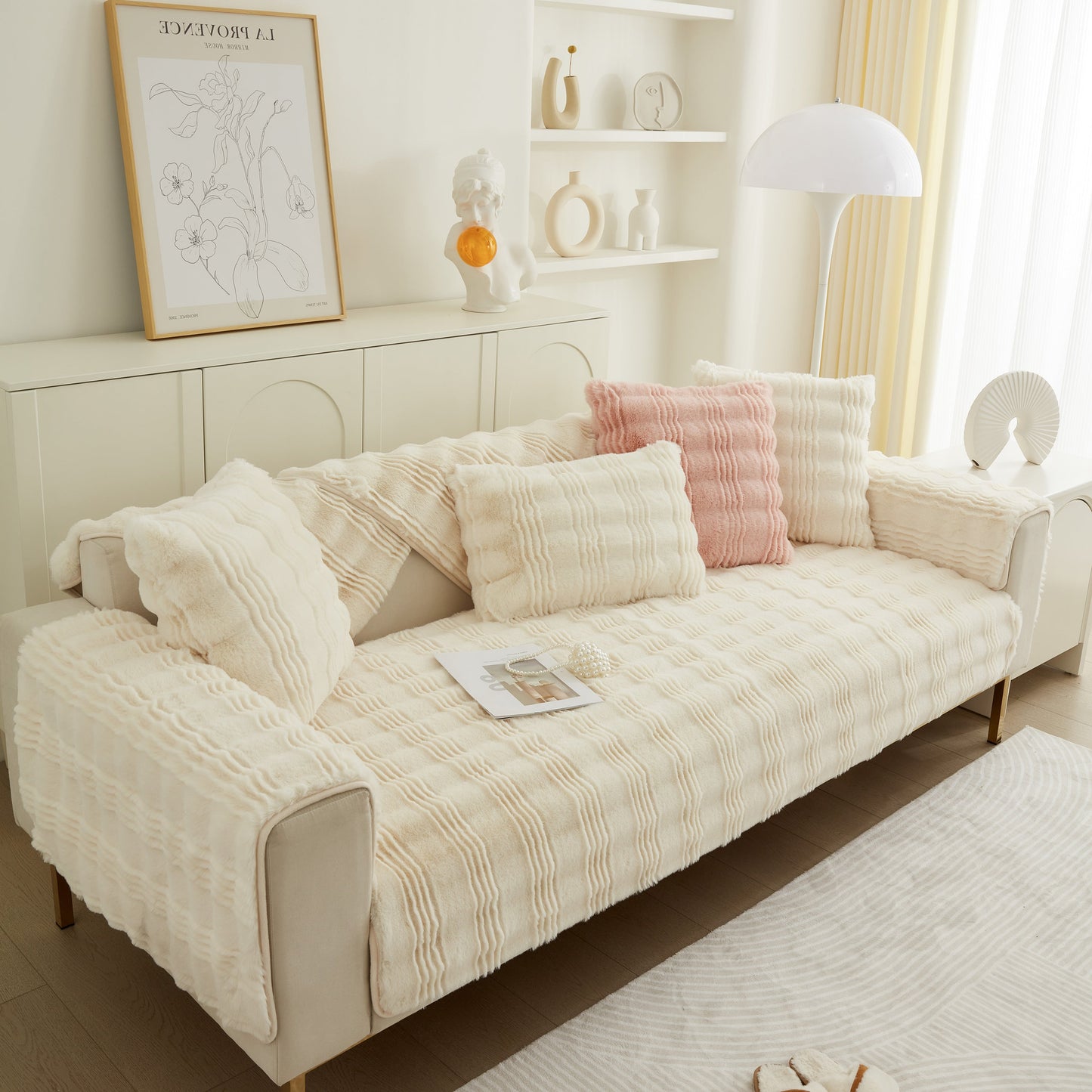 Soft Thick Faux Fur Sofa Cover Stripe Fluffy Fuzzy Non-Slip Washable Couch Covers on cream sofa with pink pillow in stylish living room