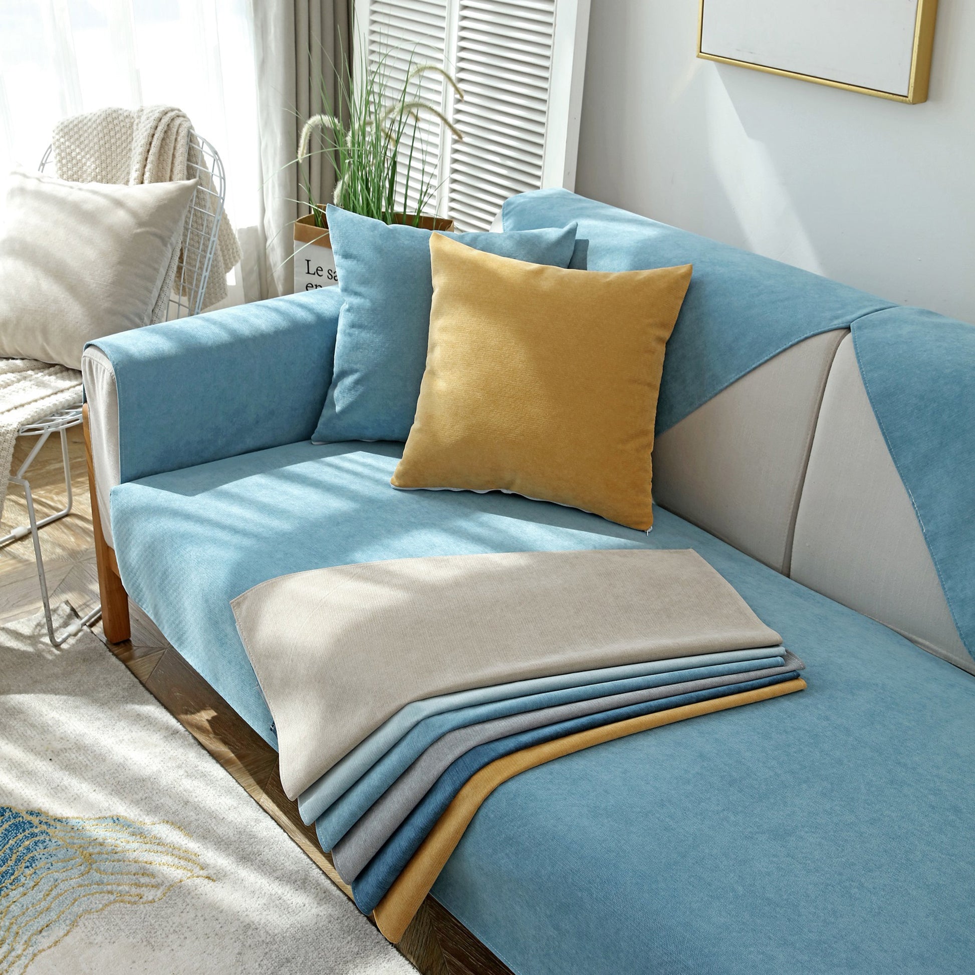 Waterproof Non-Slip Quilted Corduroy Sofa Covers for Pets, Sectional Couch Covers displayed on a light blue sofa with cushions.