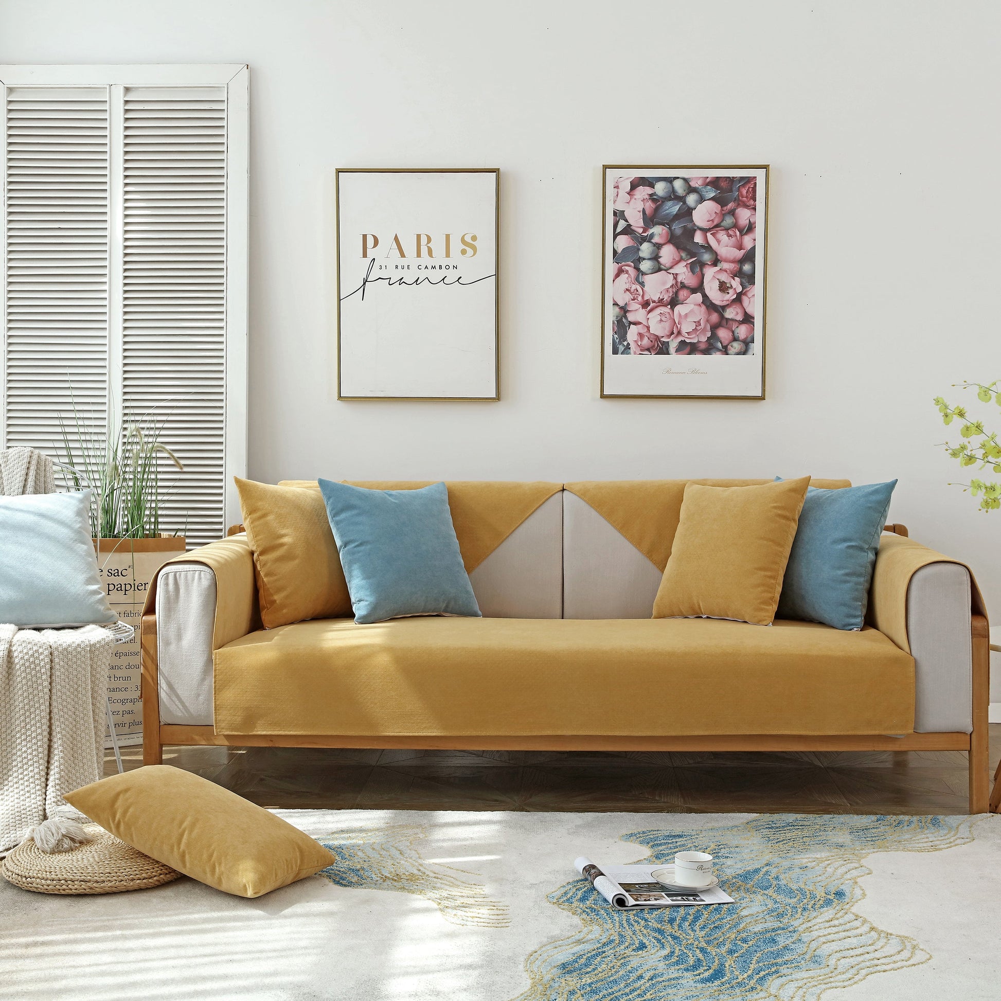 Living room with Waterproof Non-Slip Quilted Corduroy Sofa Covers for Pets, Sectional Couch Covers in yellow and blue accents.