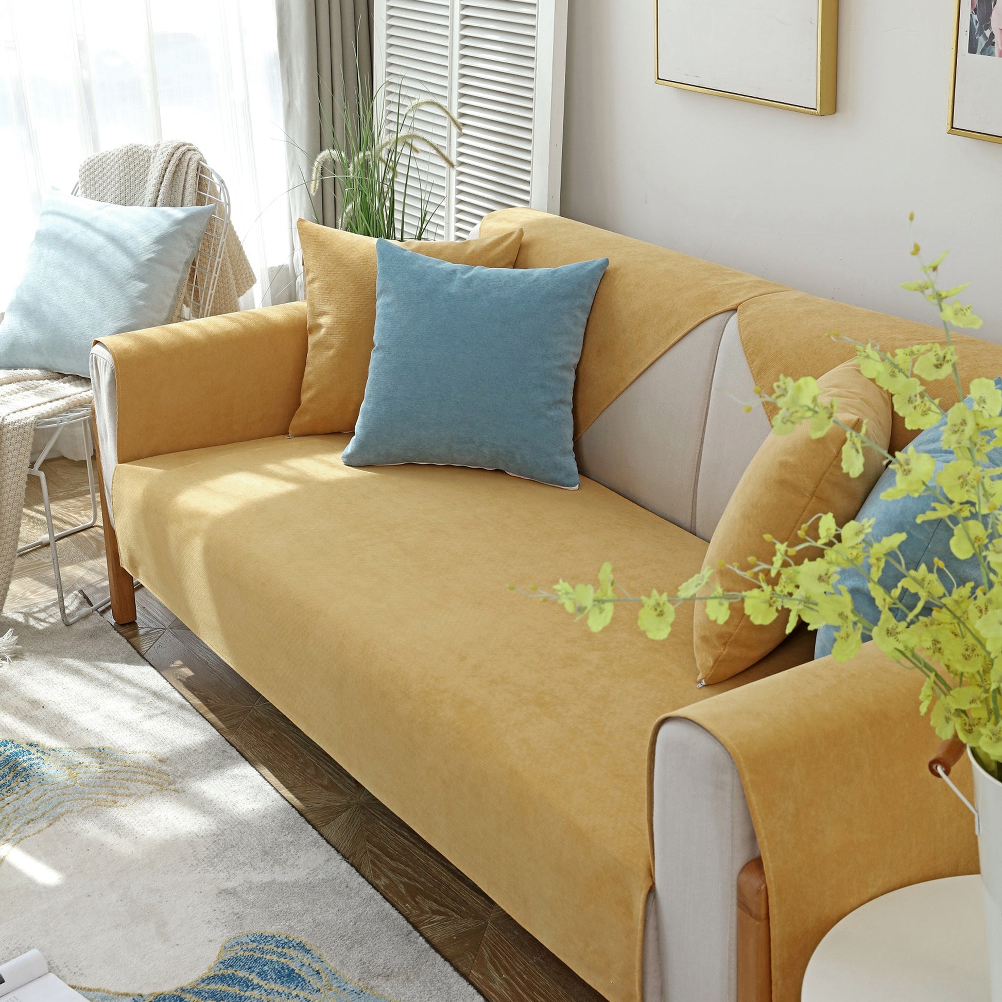 Living room with Waterproof Non-Slip Quilted Corduroy Sofa Covers for Pets, Sectional Couch Covers in a stylish interior setting.