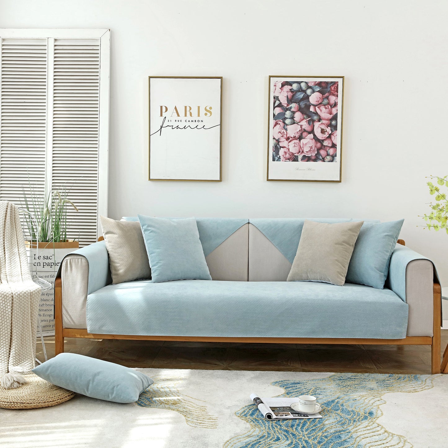 Stylish living room with Waterproof Non-Slip Quilted Corduroy Sofa Covers for Pets, Sectional Couch Covers in light blue.