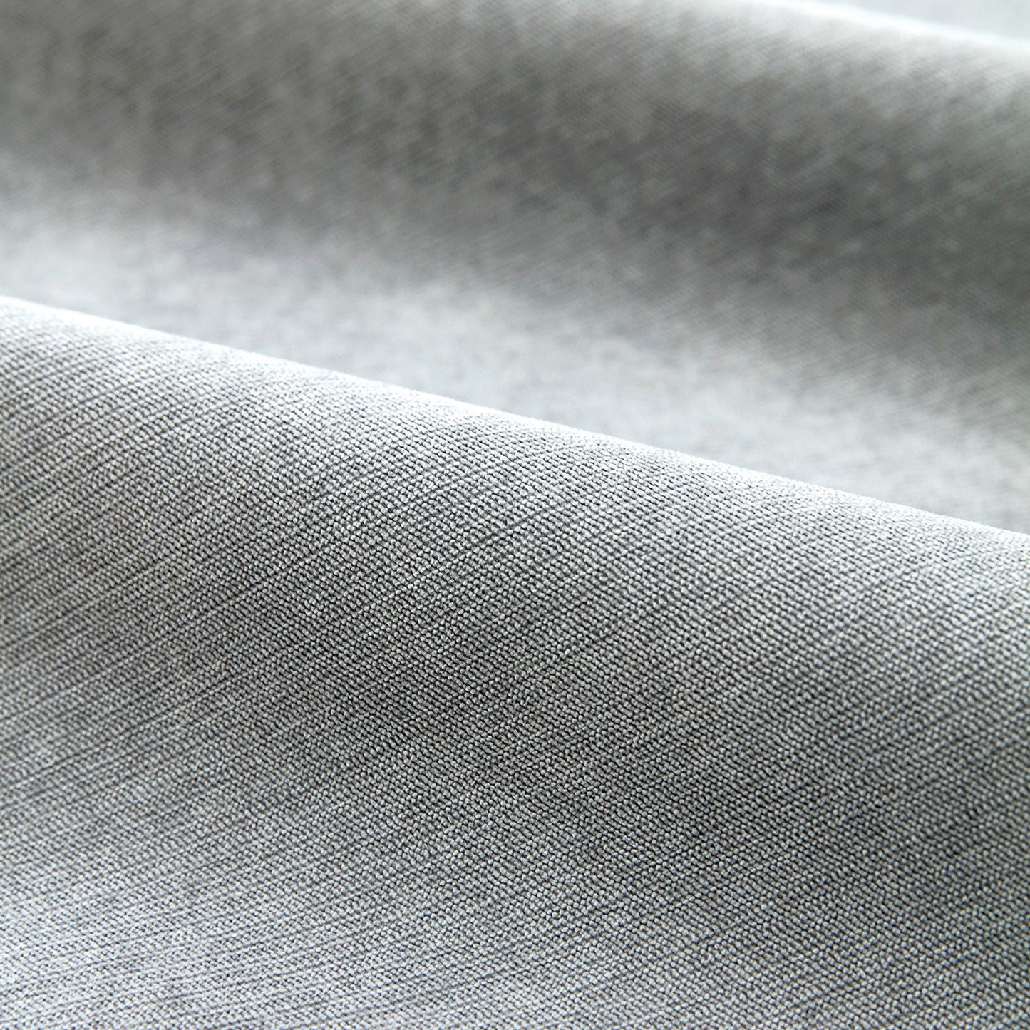Close-up of grey corduroy material used in Waterproof Non-Slip Quilted Corduroy Sofa Covers for Pets, Sectional Couch Covers.