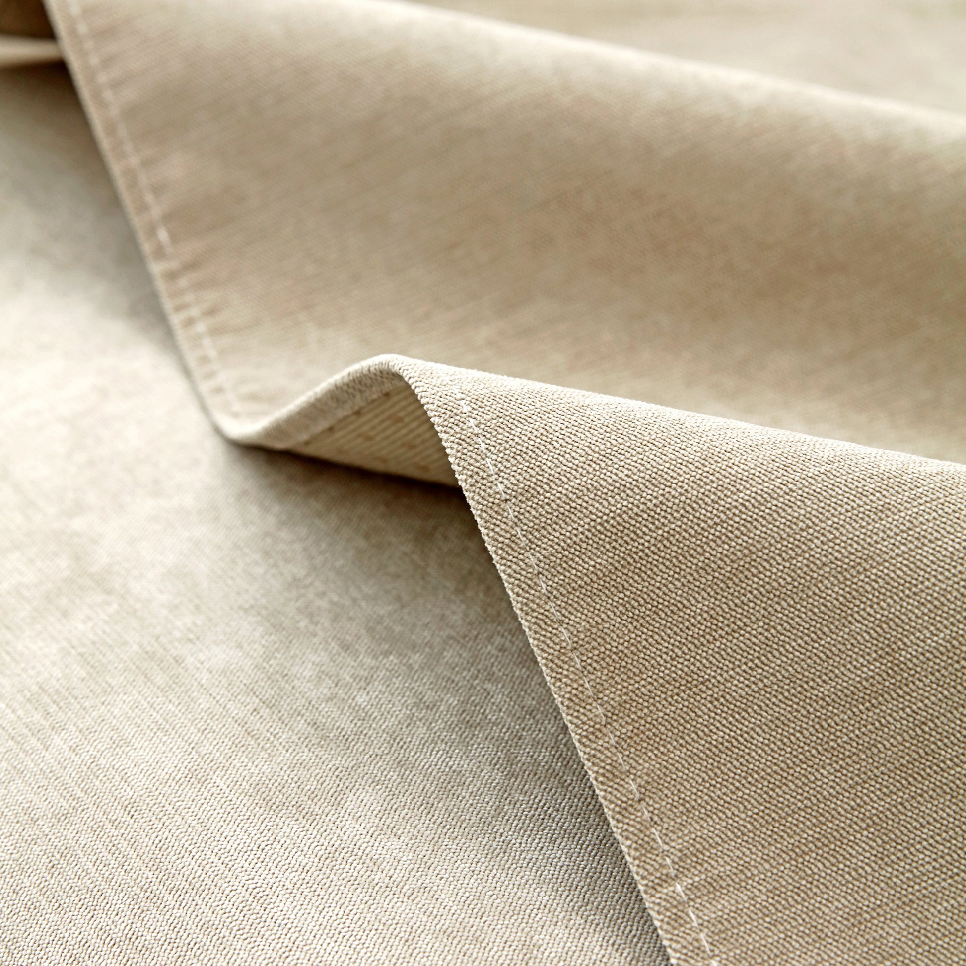 Textured beige fabric detail of Waterproof Non-Slip Quilted Corduroy Sofa Covers for Pets, Sectional Couch Covers.